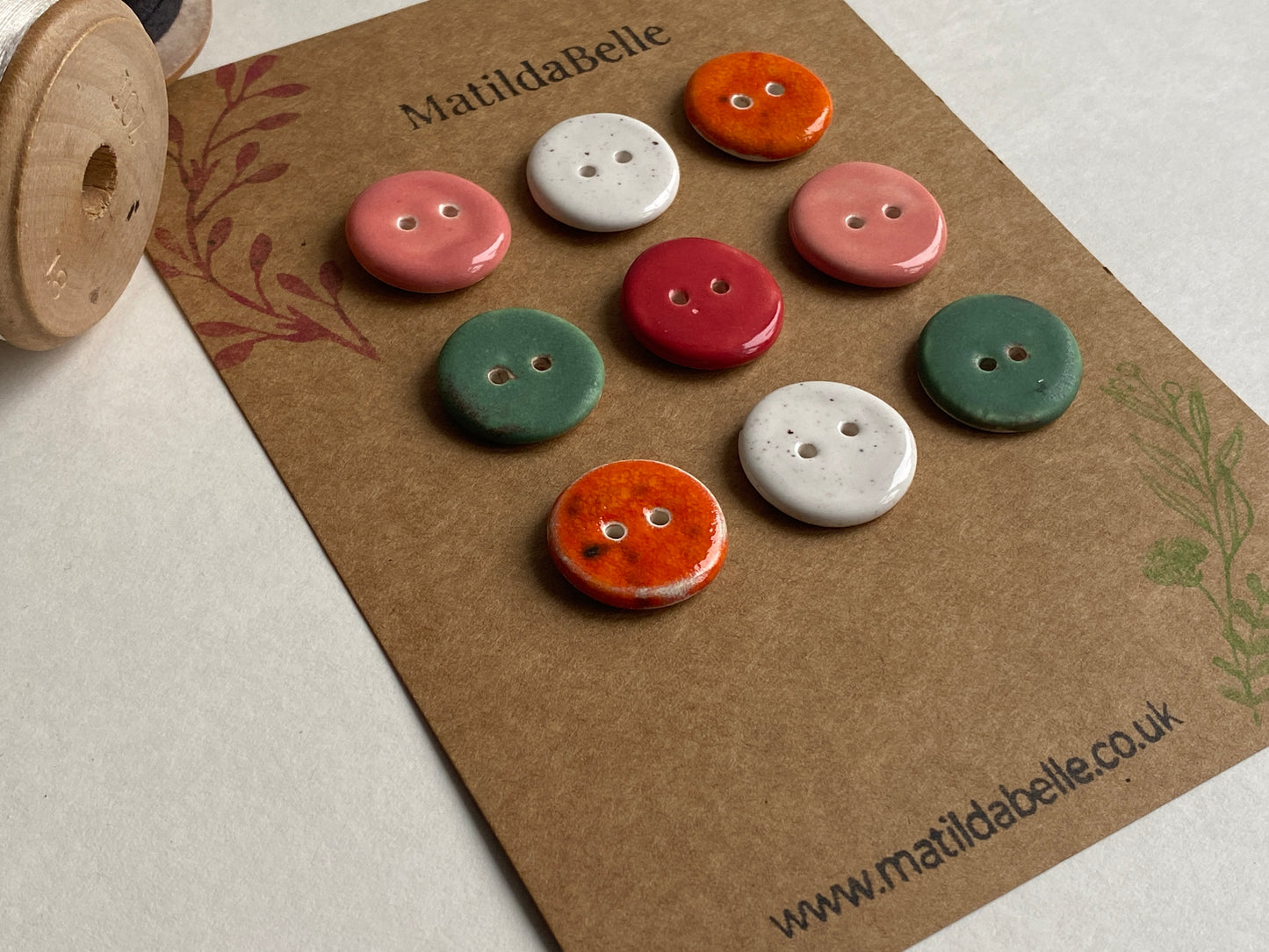 Buttons set of 9, 18mm rounds mixed colours
