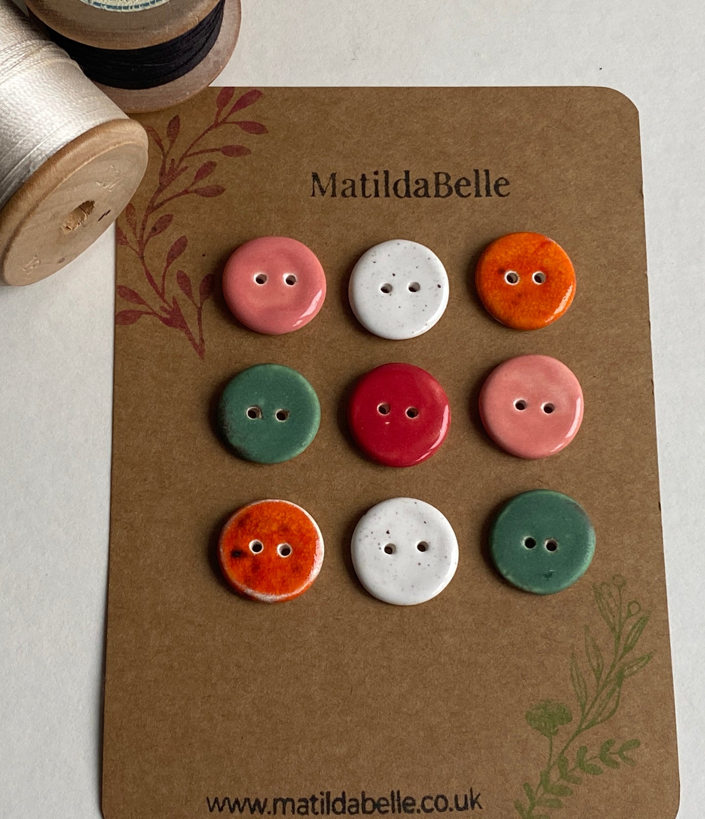 Buttons set of 9, 18mm rounds mixed colours