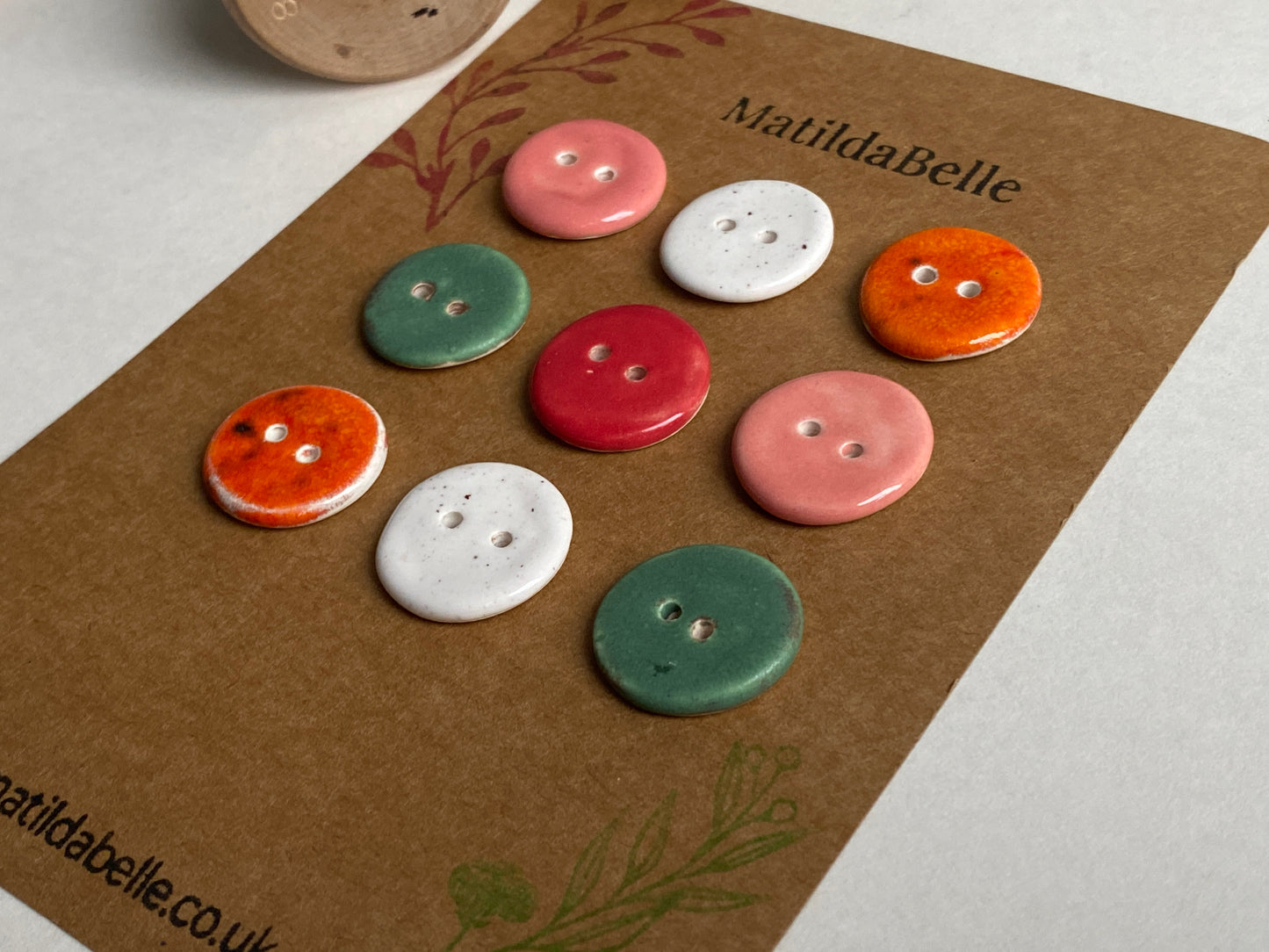Buttons set of 9, 18mm rounds mixed colours