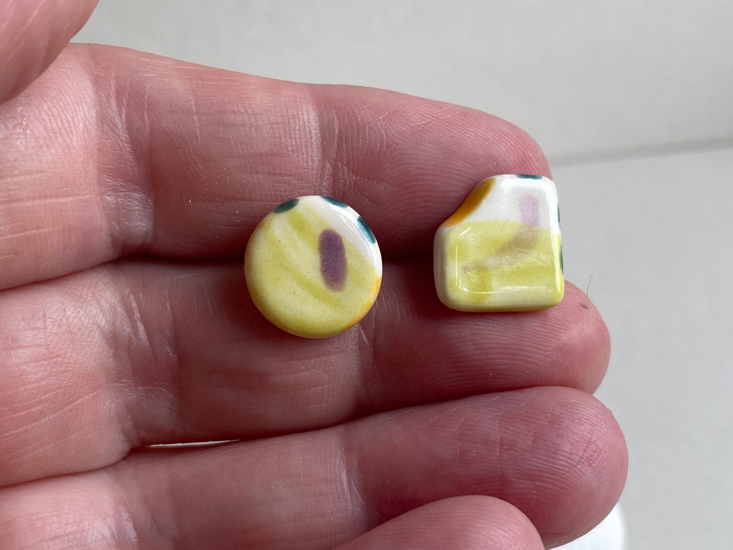 Handmade Ceramic Stud mismatched earrings with Sterling Silver