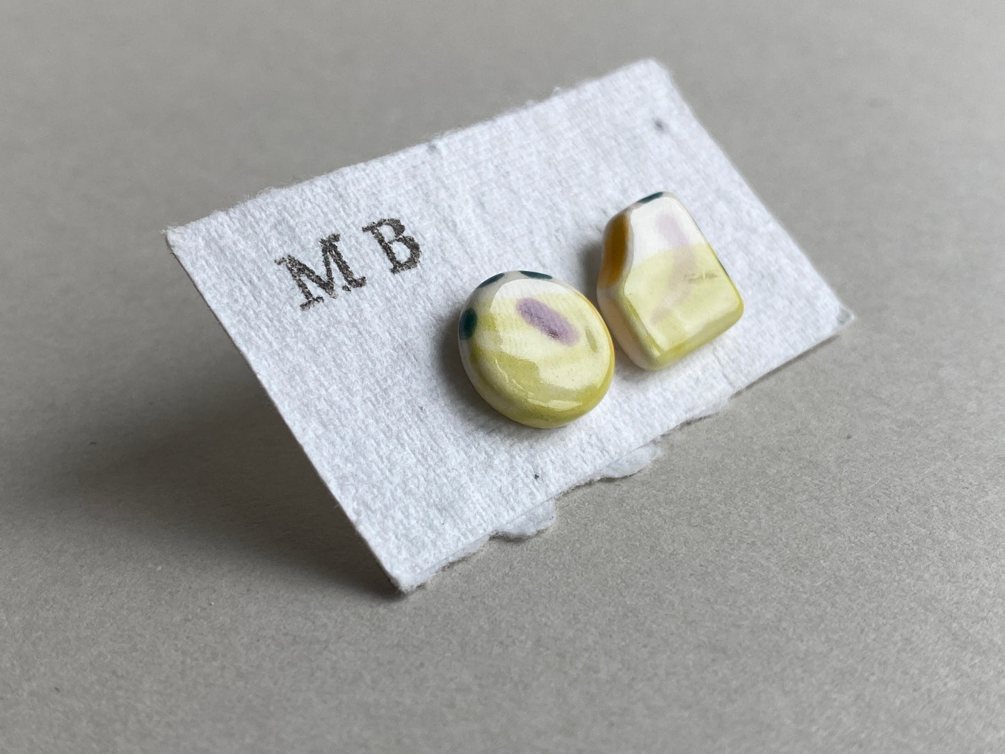 Handmade Ceramic Stud mismatched earrings with Sterling Silver