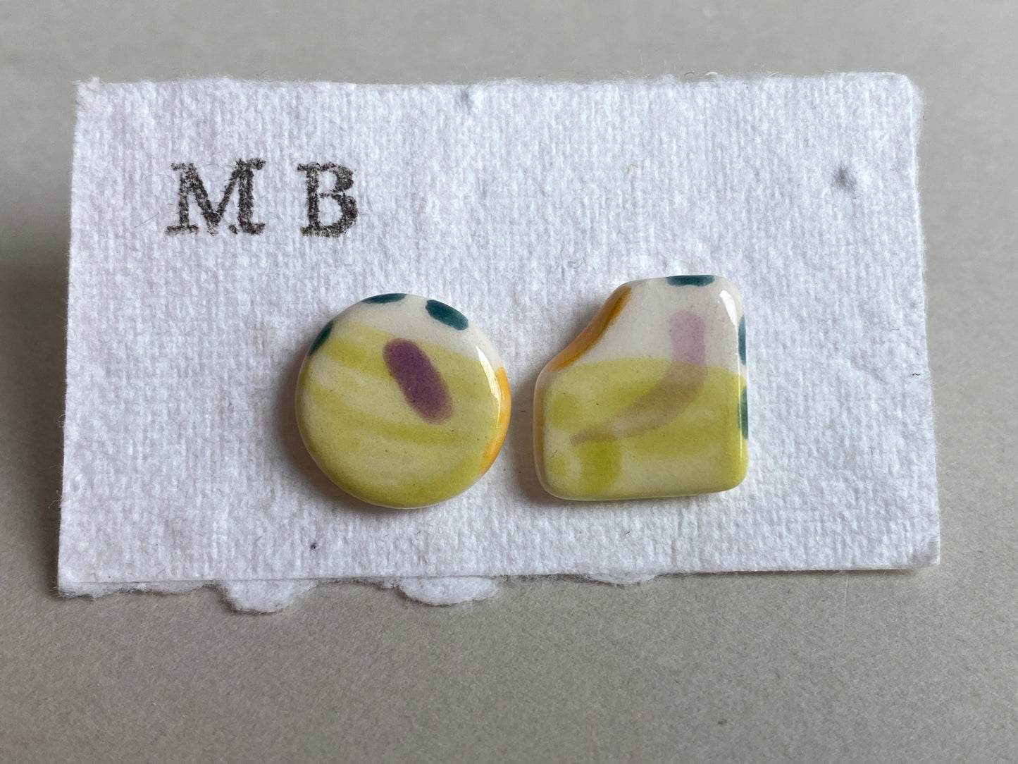 Handmade Ceramic Stud mismatched earrings with Sterling Silver