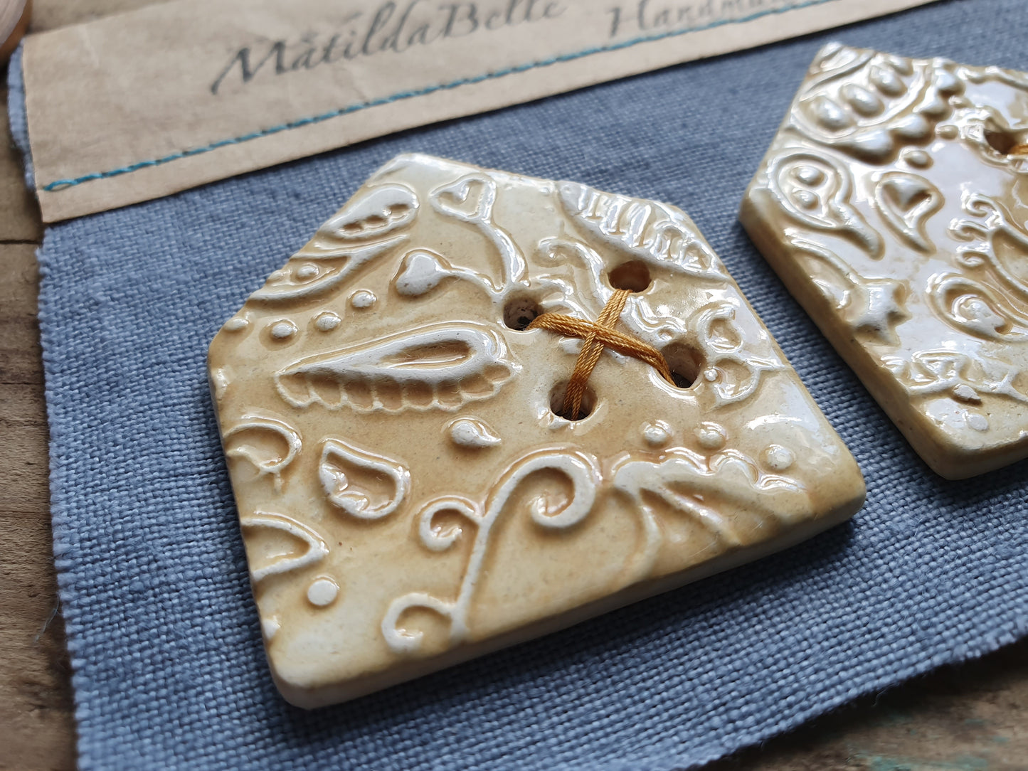 Two Ceramic Paisley HouseCeramic Buttons in Ochre