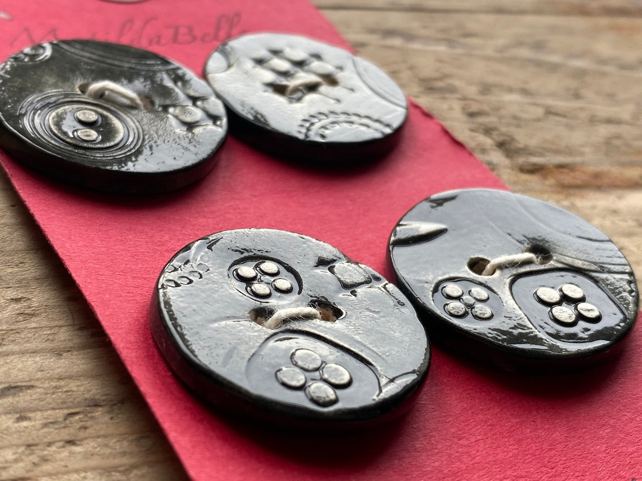 Set of Four Black handmade Ceramic Round Buttons 28mm