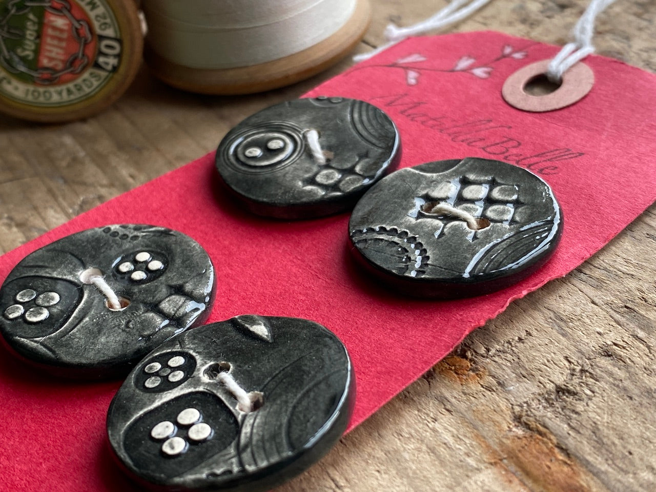 Set of Four Black handmade Ceramic Round Buttons 28mm