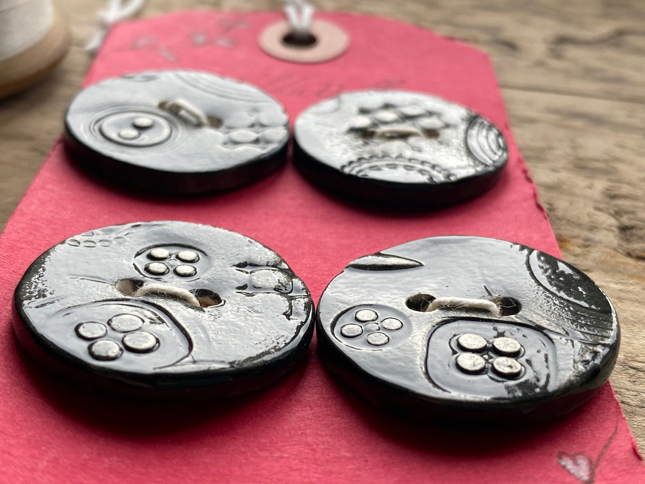 Set of Four Black handmade Ceramic Round Buttons 28mm