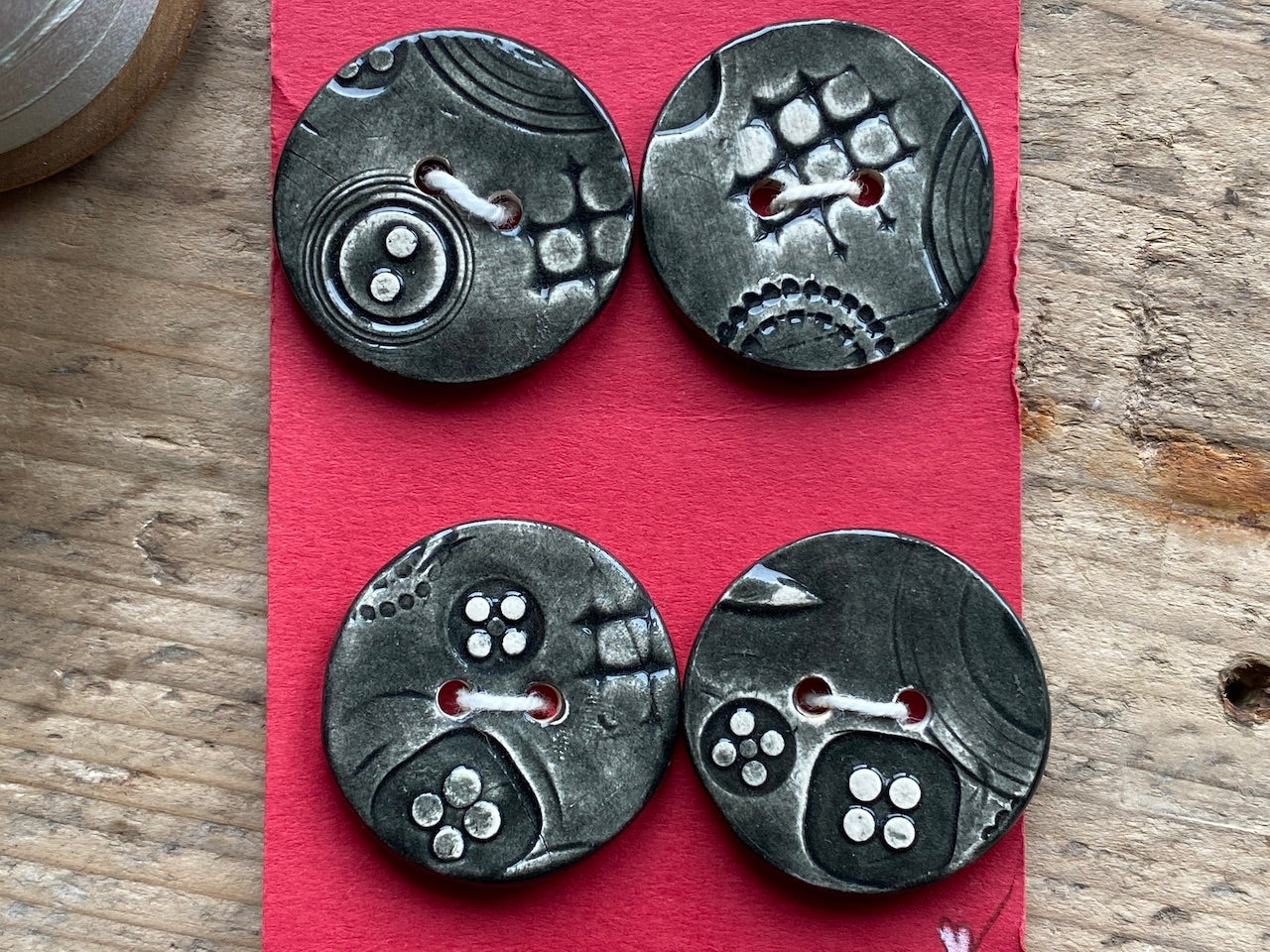 Set of Four Black handmade Ceramic Round Buttons 28mm