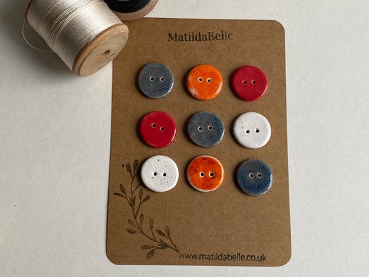 Buttons set of 9, 22mm rounds mixed colours