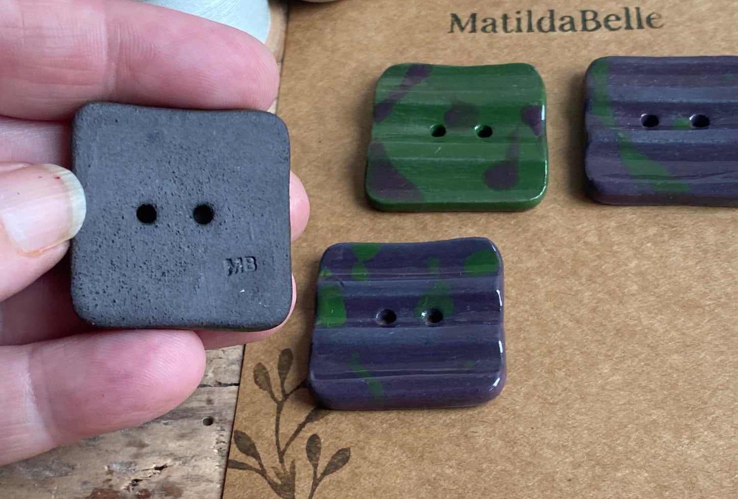 Set of 4 square 30mm Stoneware Buttons rippled Purple and Green Camo