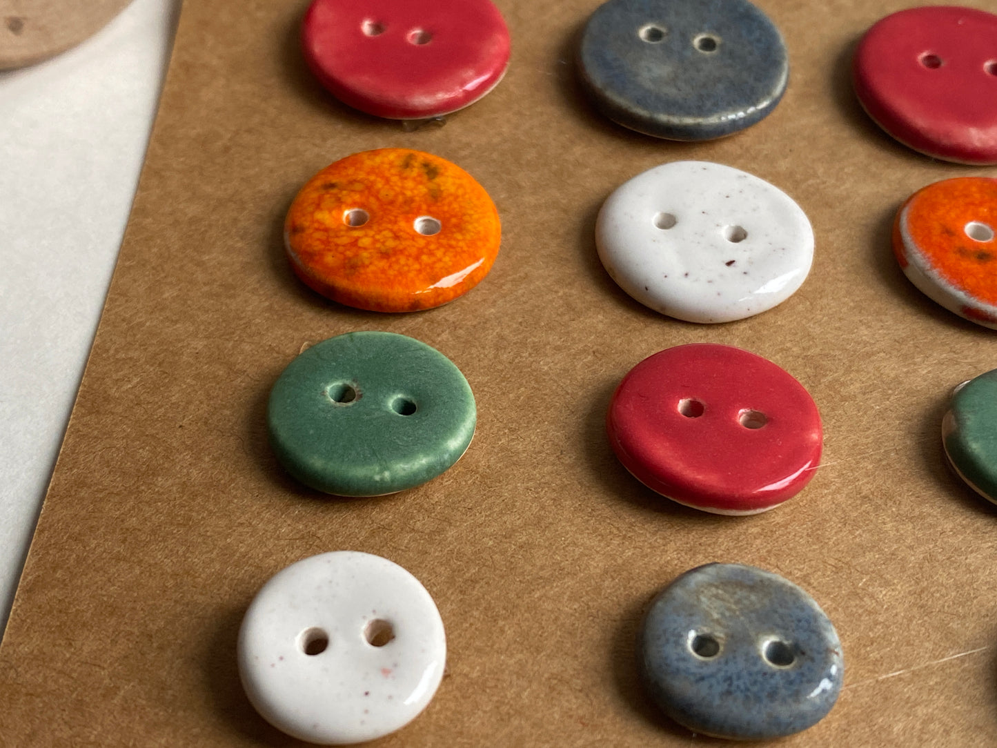 Buttons set of 12, 14mm-23mm rounds mixed colours