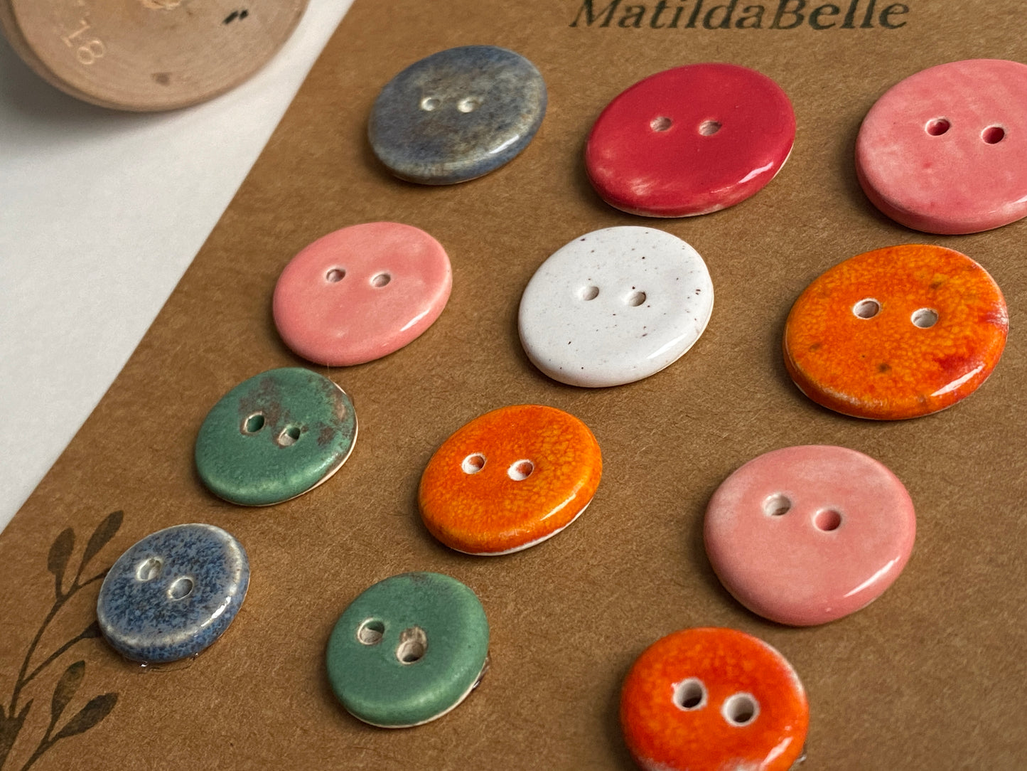 Buttons set of 12, 14mm-23mm rounds mixed colours