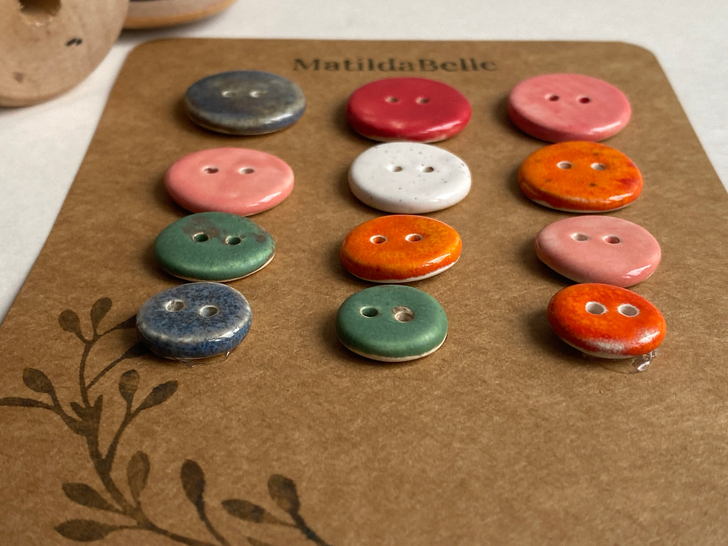 Buttons set of 12, 14mm-23mm rounds mixed colours