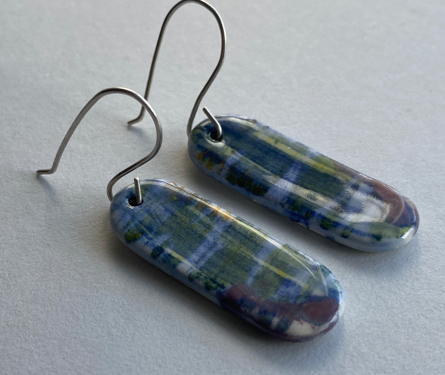 Ceramic painterly Dangle Earrings - Blues - Hung on handmade silver wires