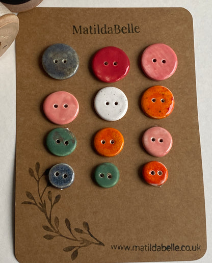 Buttons set of 12, 14mm-23mm rounds mixed colours