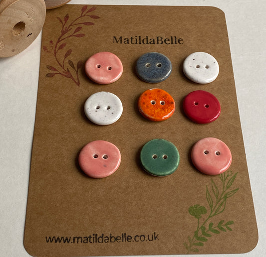 Buttons set of 9, 18mm rounds mixed colours