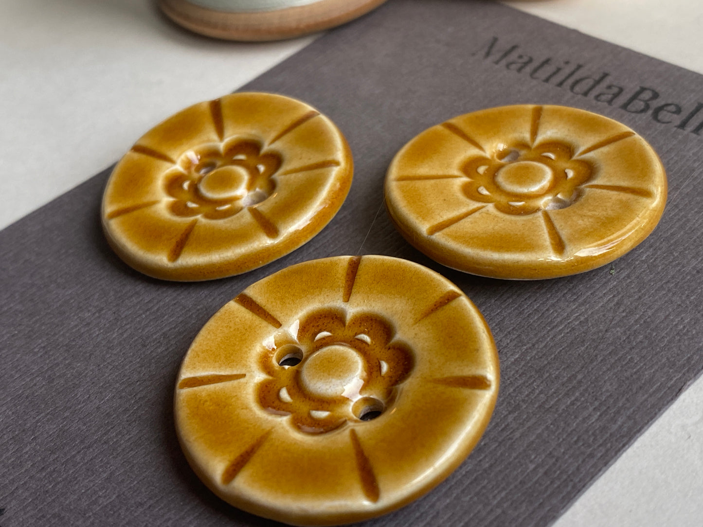 Set of Three vintage style handmade 33mm ceramic round buttons in Honey