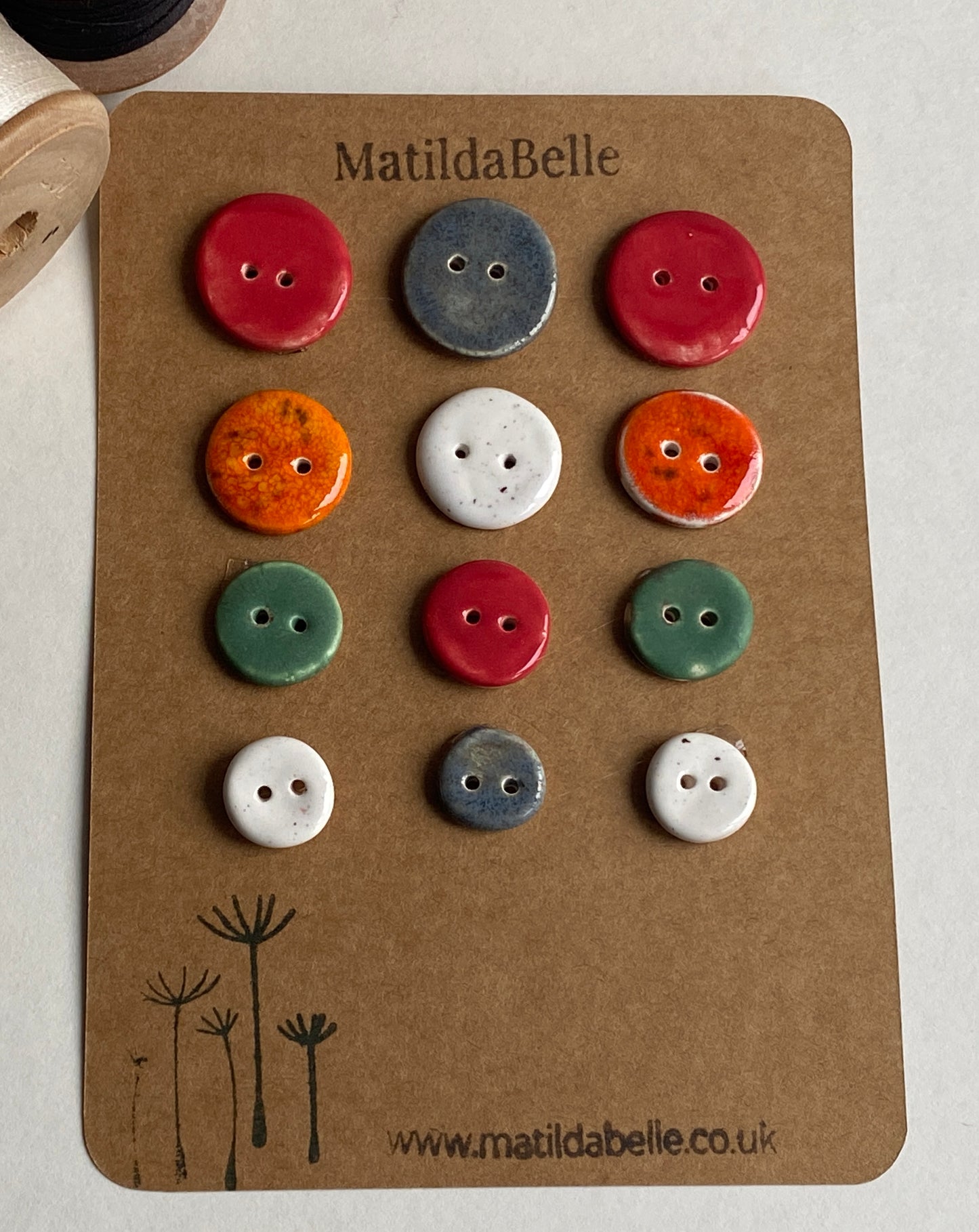 Buttons set of 12, 14mm-23mm rounds mixed colours