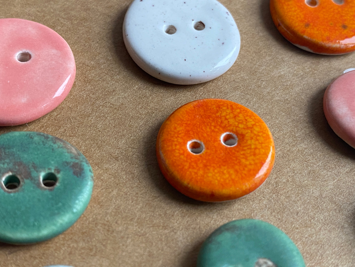 Buttons set of 12, 14mm-23mm rounds mixed colours