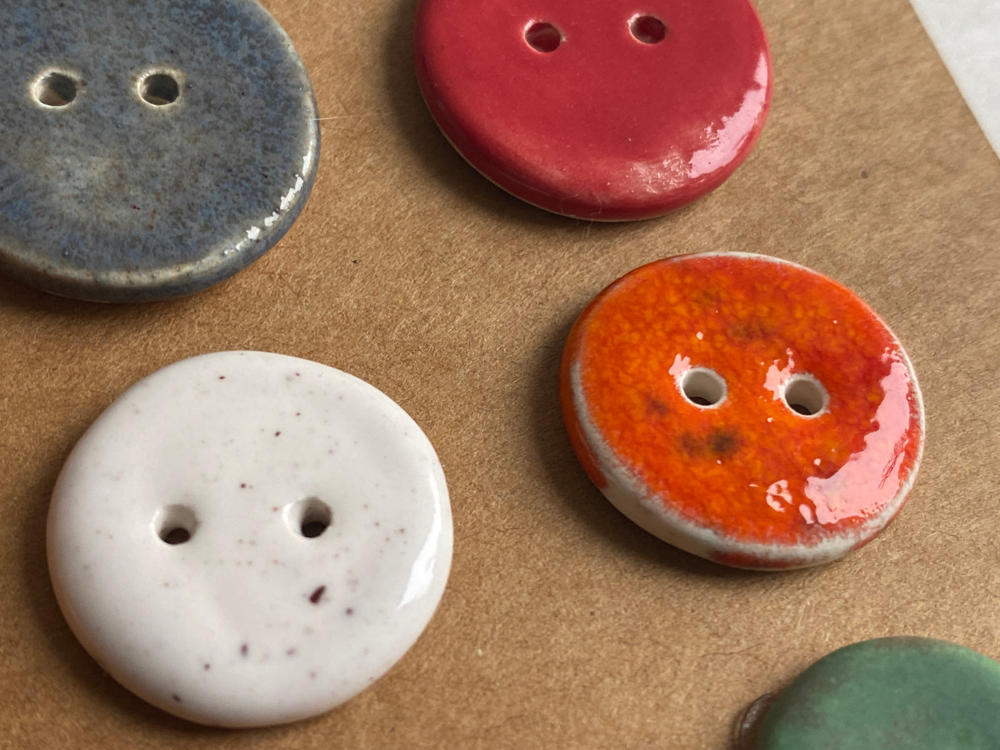 Buttons set of 12, 14mm-23mm rounds mixed colours