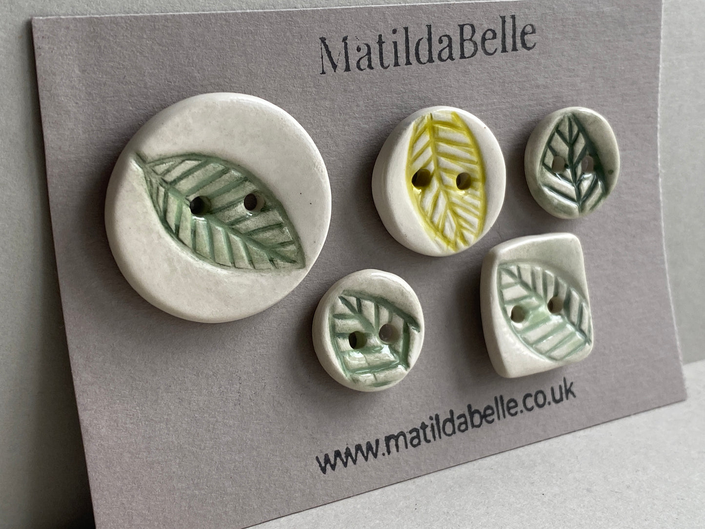 Set of Five mismatched Handmade Ceramic Buttons Leaf design