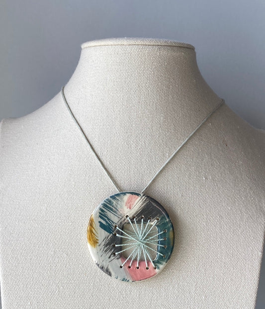 Handmade Ceramic Round Pendant - Grey, Teal, Black, Pink & Ochre, Pale Blue Stitching, Unique Brushstroke Design