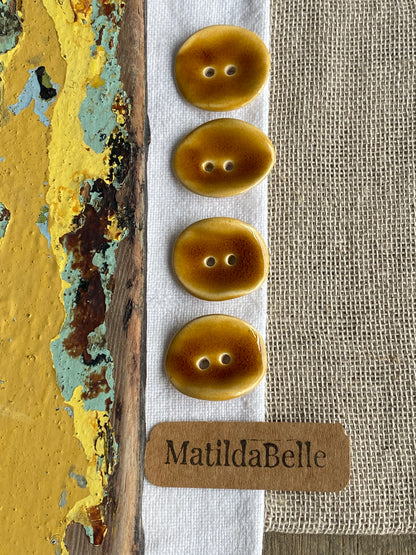 Set of 4 Round Curled Buttons - Rich Honey Glaze