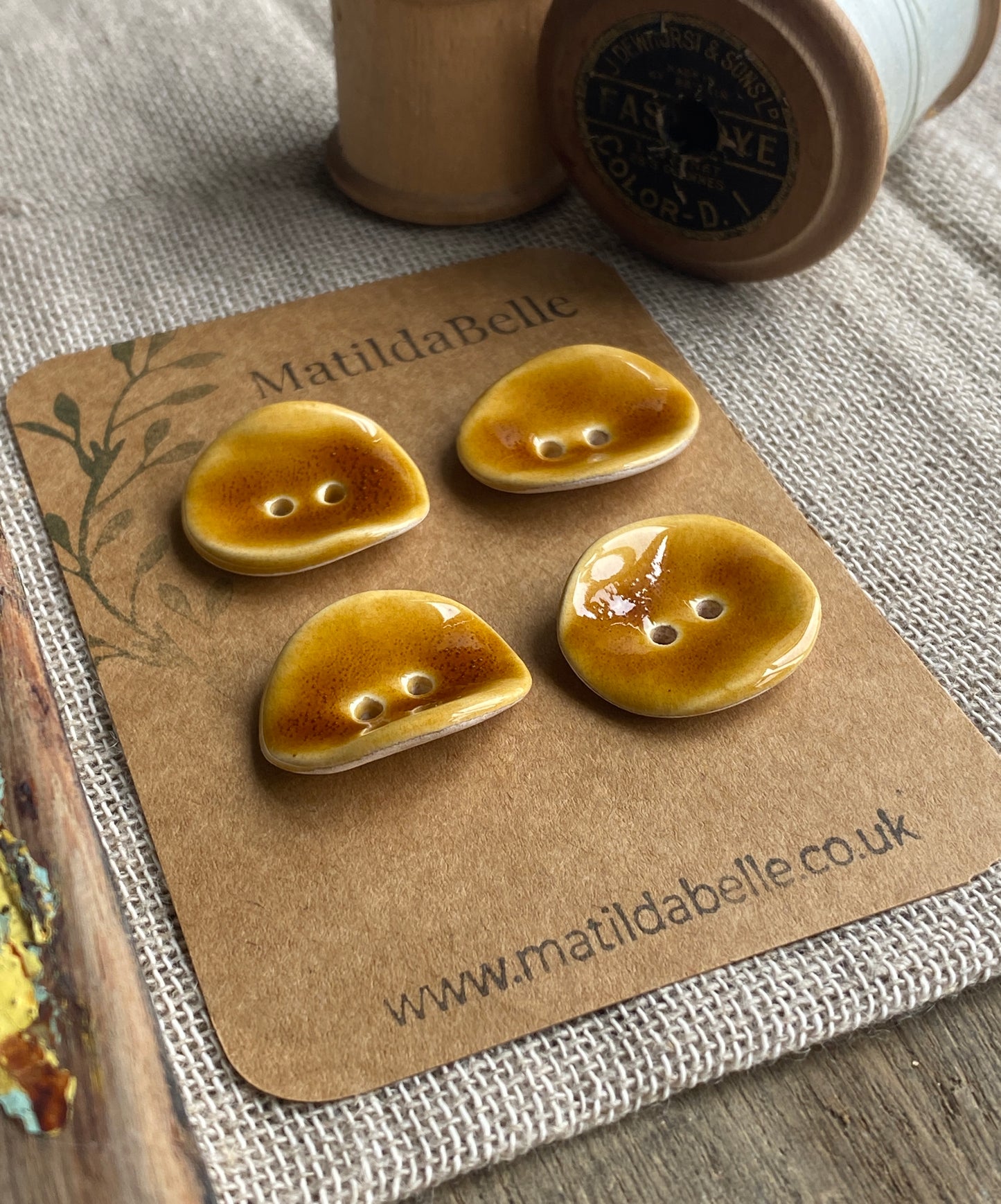 Set of 4 Round Curled Buttons - Rich Honey Glaze