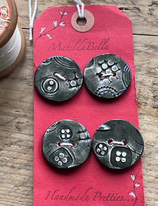 Set of Four Black handmade Ceramic Round Buttons 28mm